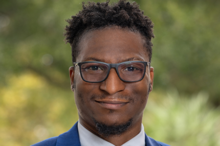 Headshot of Domonique Cora Rora